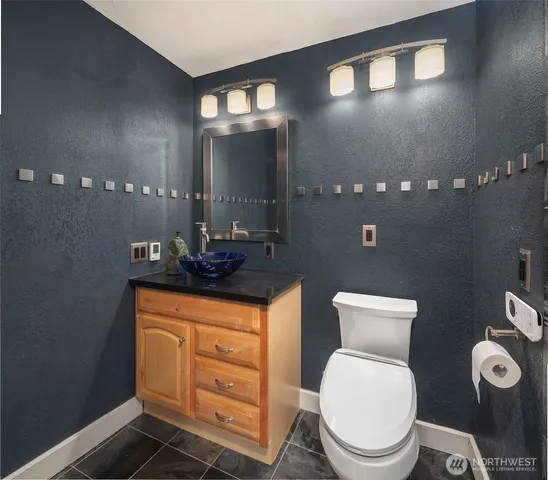 a view of a house with large windows