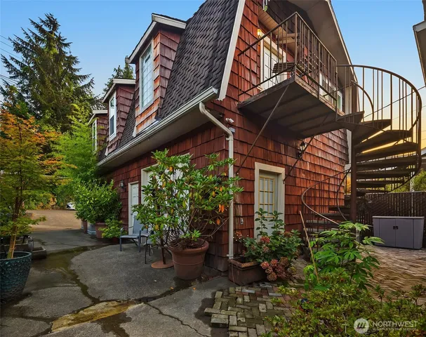 a kitchen with stainless steel appliances granite countertop a stove and a refrigerator