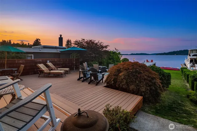 a view of a chairs and table in patio