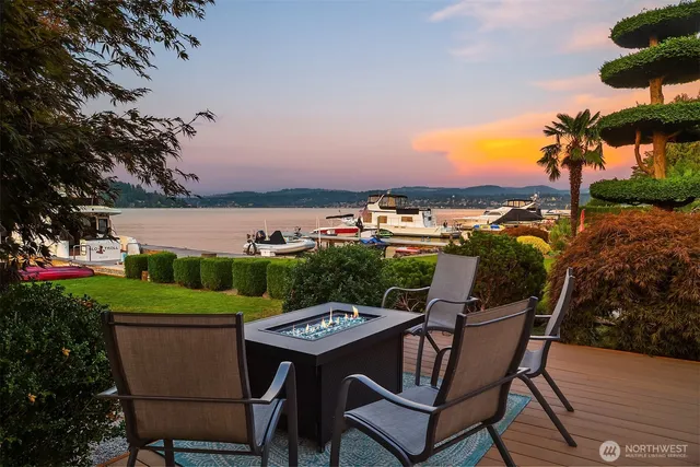 a patio with table and chairs