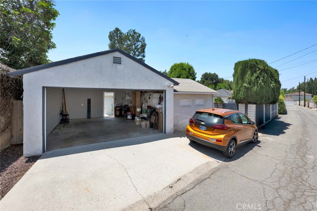 5456 Cadbury Road Whittier, CA 90601 - Photo 63 of 67 a car parked in front of house