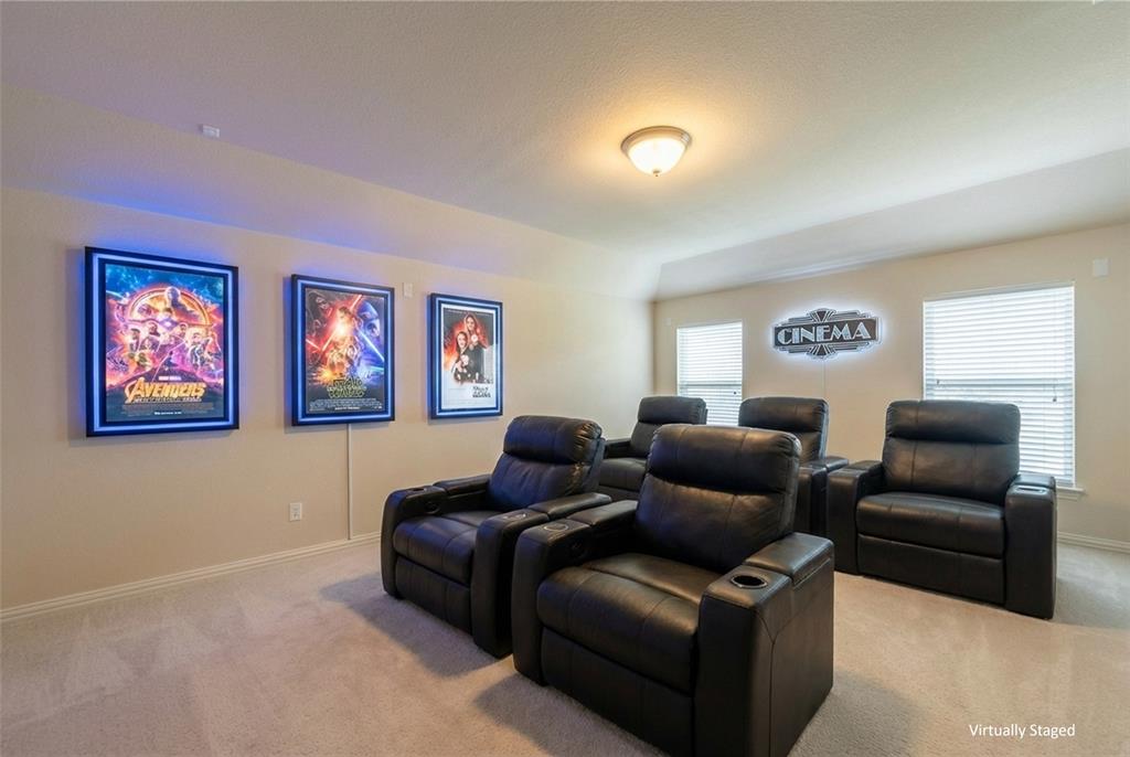 5143 Stream Crest Way Fairview, TX 75069 - Photo 24 of 35 Cinema with light colored carpet