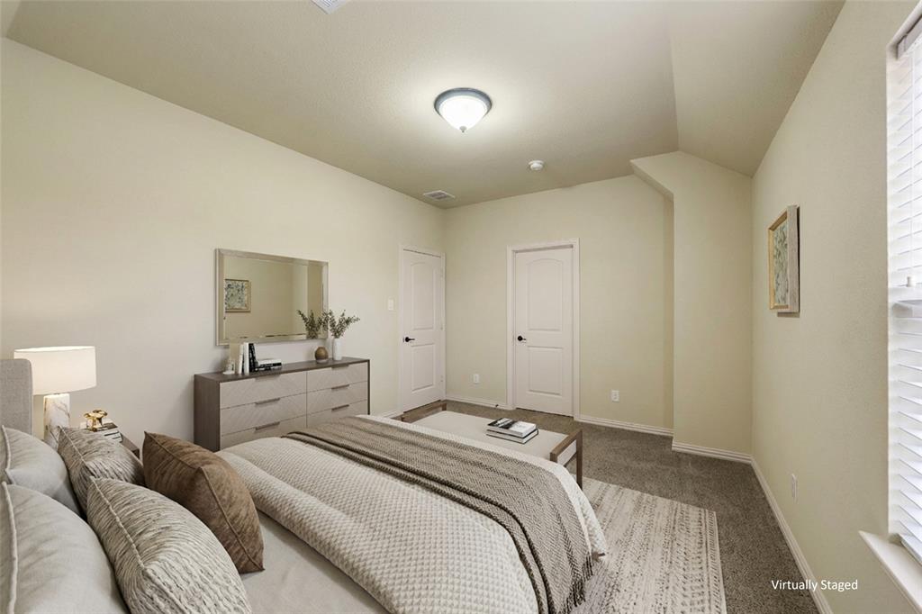 5143 Stream Crest Way Fairview, TX 75069 - Photo 25 of 35 Bedroom 2. Carpeted bedroom with baseboards