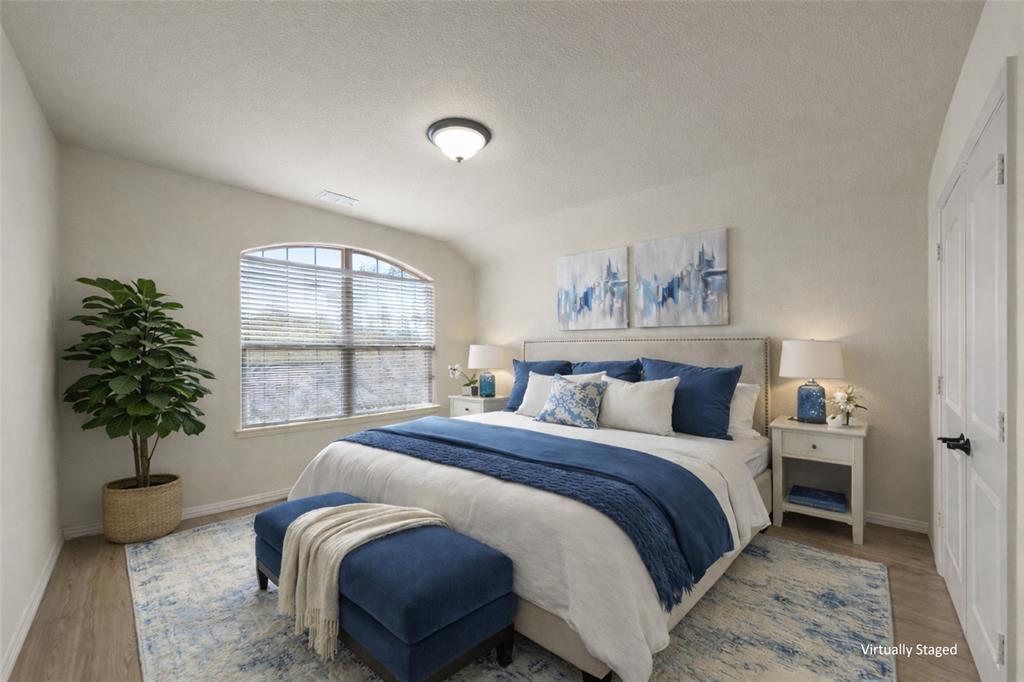 5143 Stream Crest Way Fairview, TX 75069 - Photo 29 of 35 Bedroom 4. Bedroom with wood finished floors