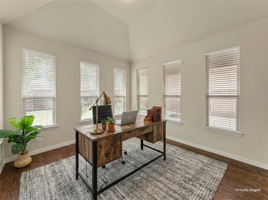5143 Stream Crest Way Fairview, TX 75069 - Photo 6 of 35 Office area featuring dark wood-style flooring and vaulted ceiling