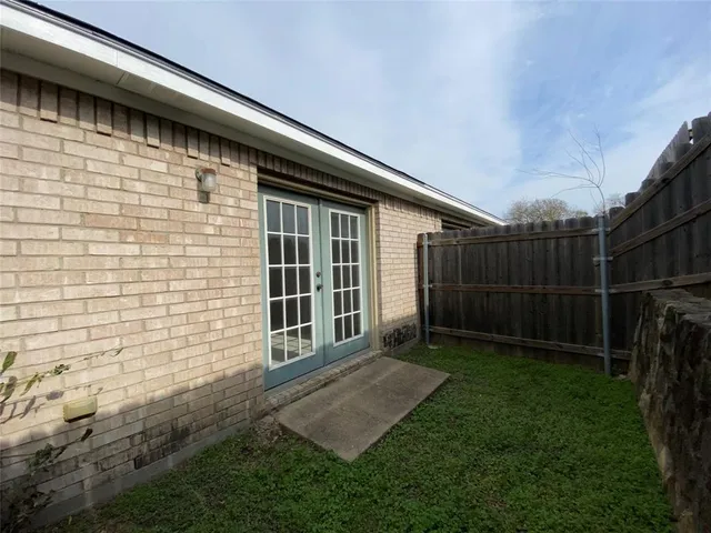 a view of backyard with green space