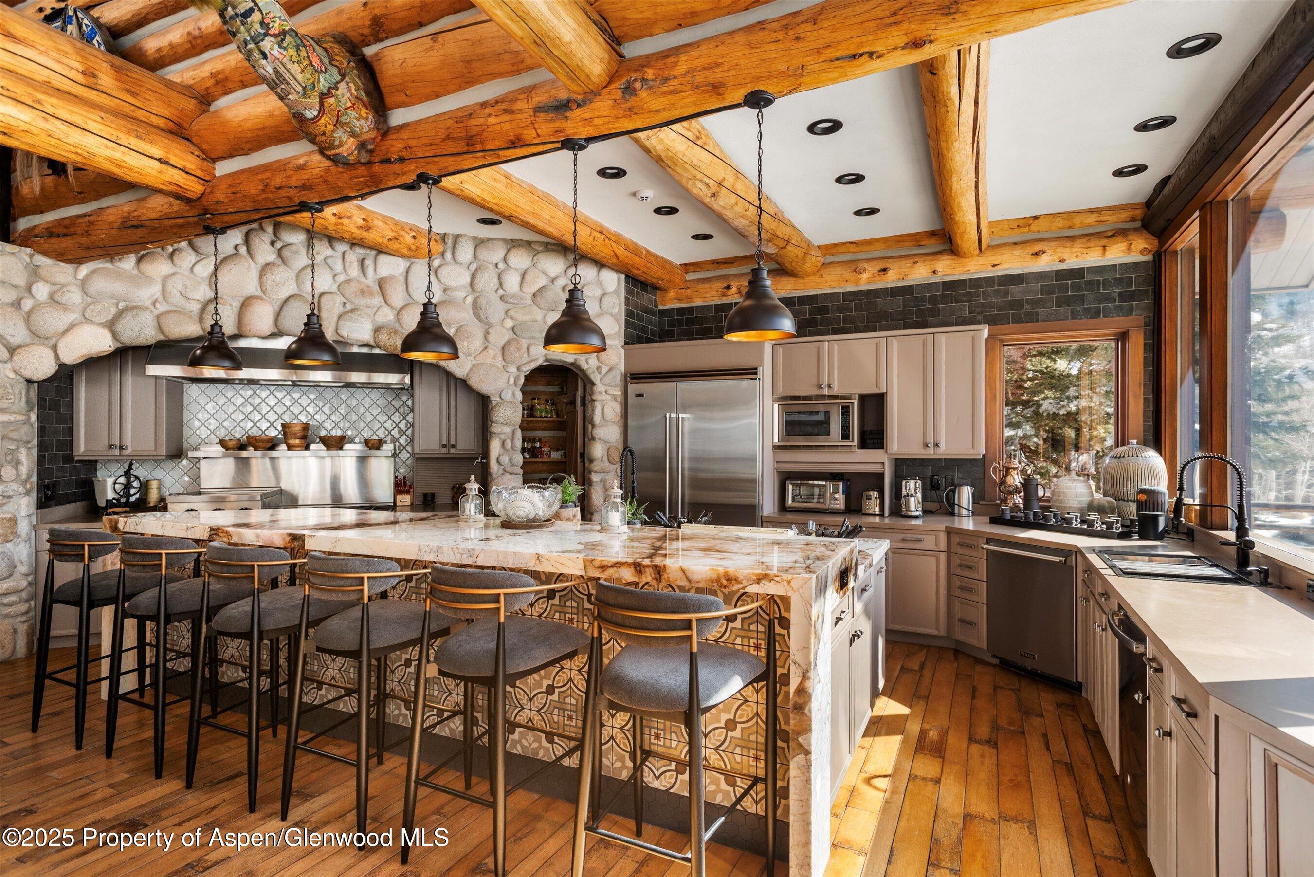 303 Conundrum Creek Road Aspen, CO 81611 - Photo 2 of 39 a dining table seating space