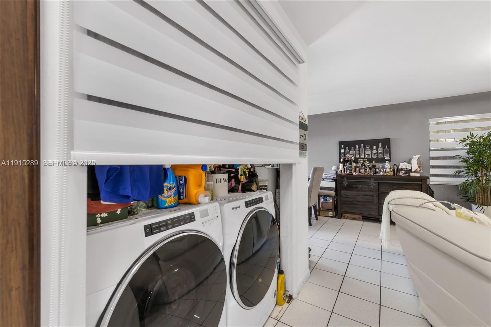3631 Southwest 27th Street Miami, FL 33133 - Photo 14 of 24 a utility room with dryer and washer