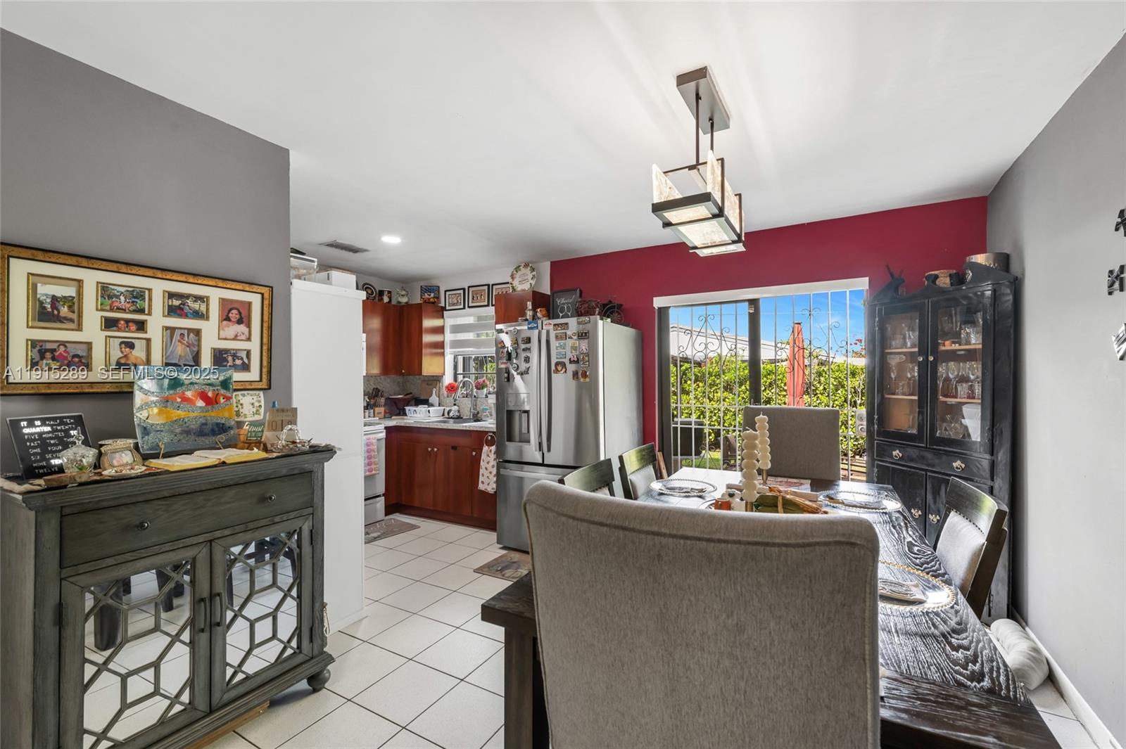 3631 Southwest 27th Street Miami, FL 33133 - Photo 10 of 24 a kitchen with sink and refrigerator