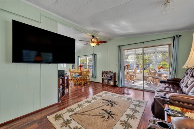 a view of a chairs and table in the patio