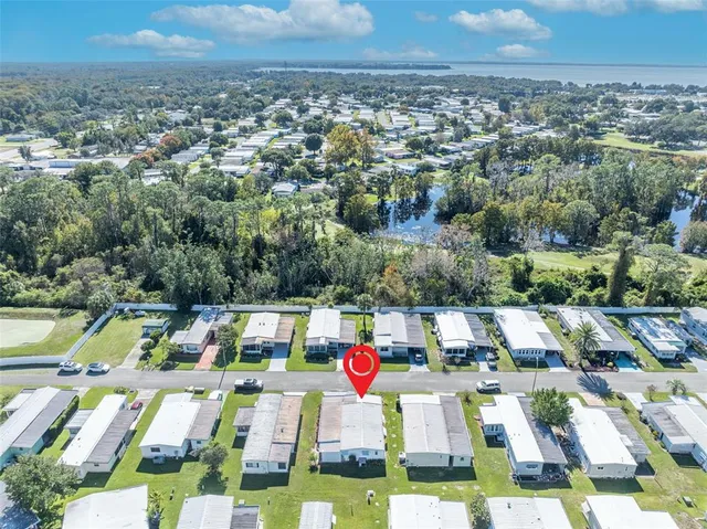 an aerial view of a house with a garden