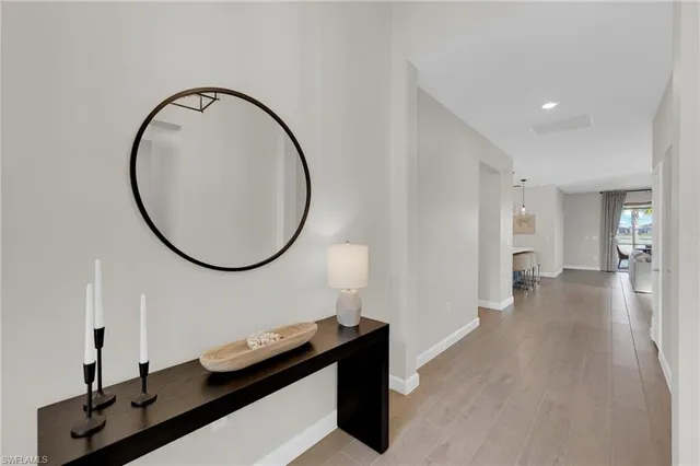 a bathroom with a double vanity sink mirror and shower