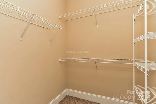 a view of a room with racks on the wall
