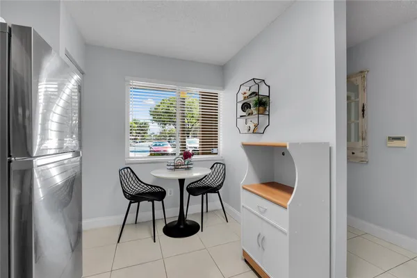 a workspace with furniture and window