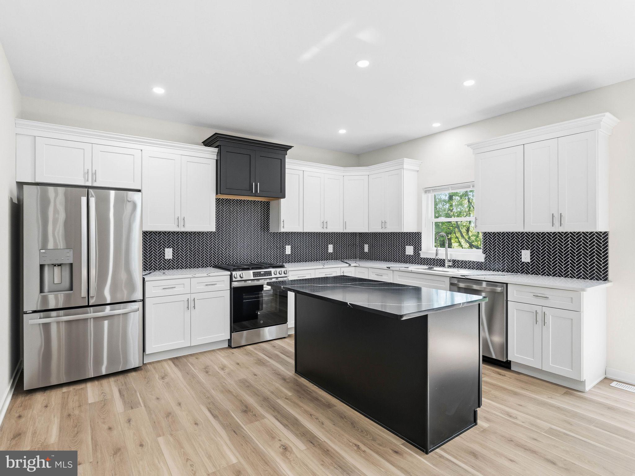 400 Paulsboro Road Swedesboro, NJ 08085 - Photo 15 of 54 Sleek modern kitchen with stylish contrasts.