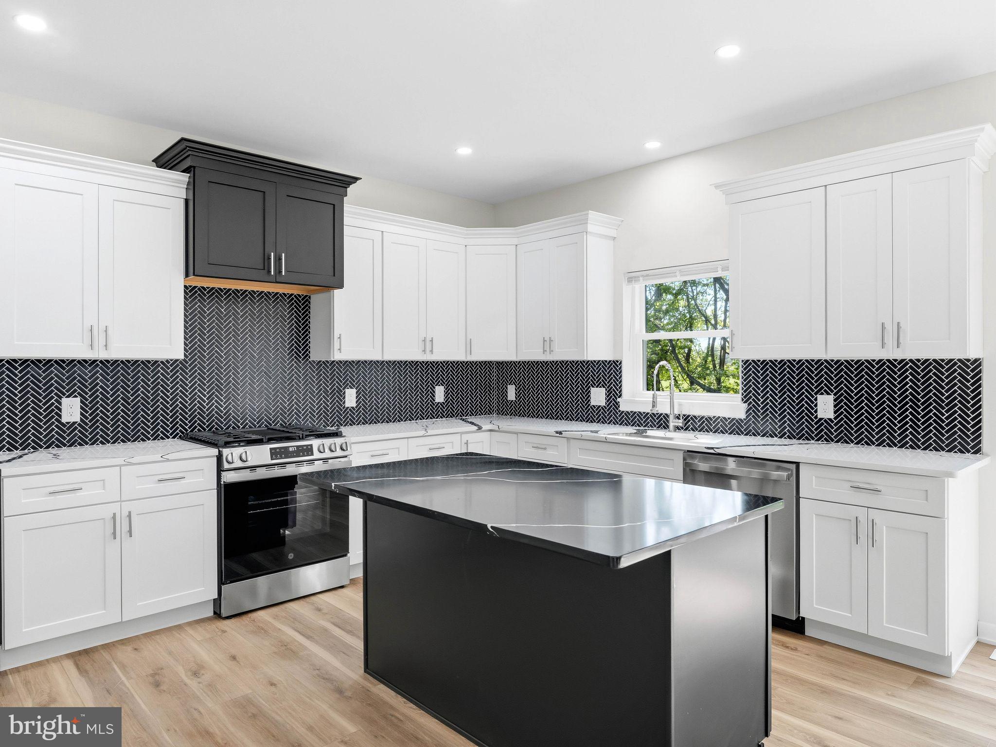 400 Paulsboro Road Swedesboro, NJ 08085 - Photo 16 of 54 Modern kitchen with sleek contrasts.