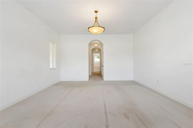 a view of an empty room with window