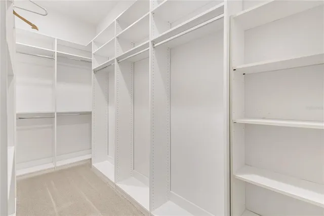 a view of a room with racks on the wall