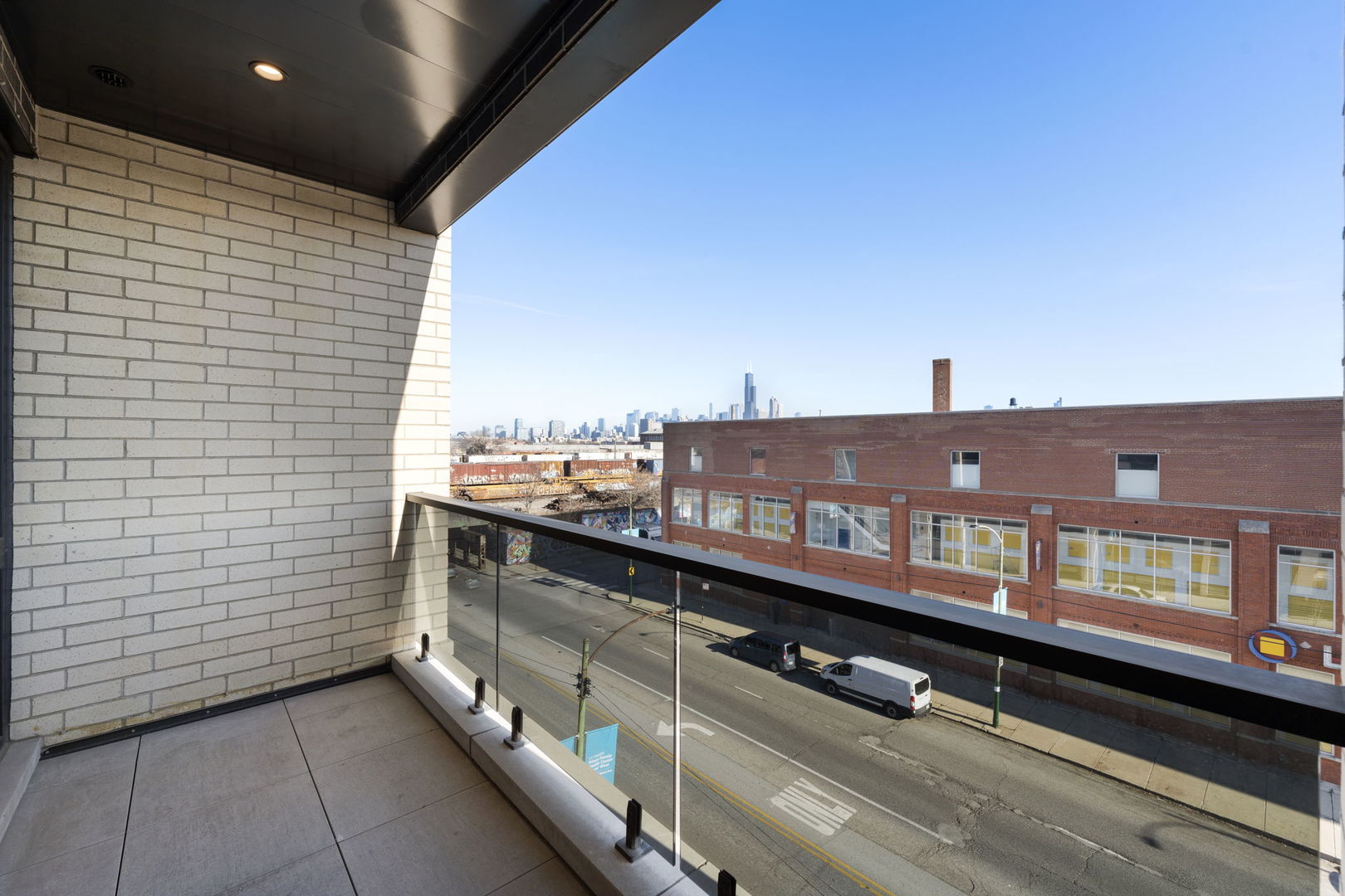 1606 South Ashland Avenue, Unit 401 Chicago, IL 60608 - Photo 22 of 25 a view of a balcony with city view