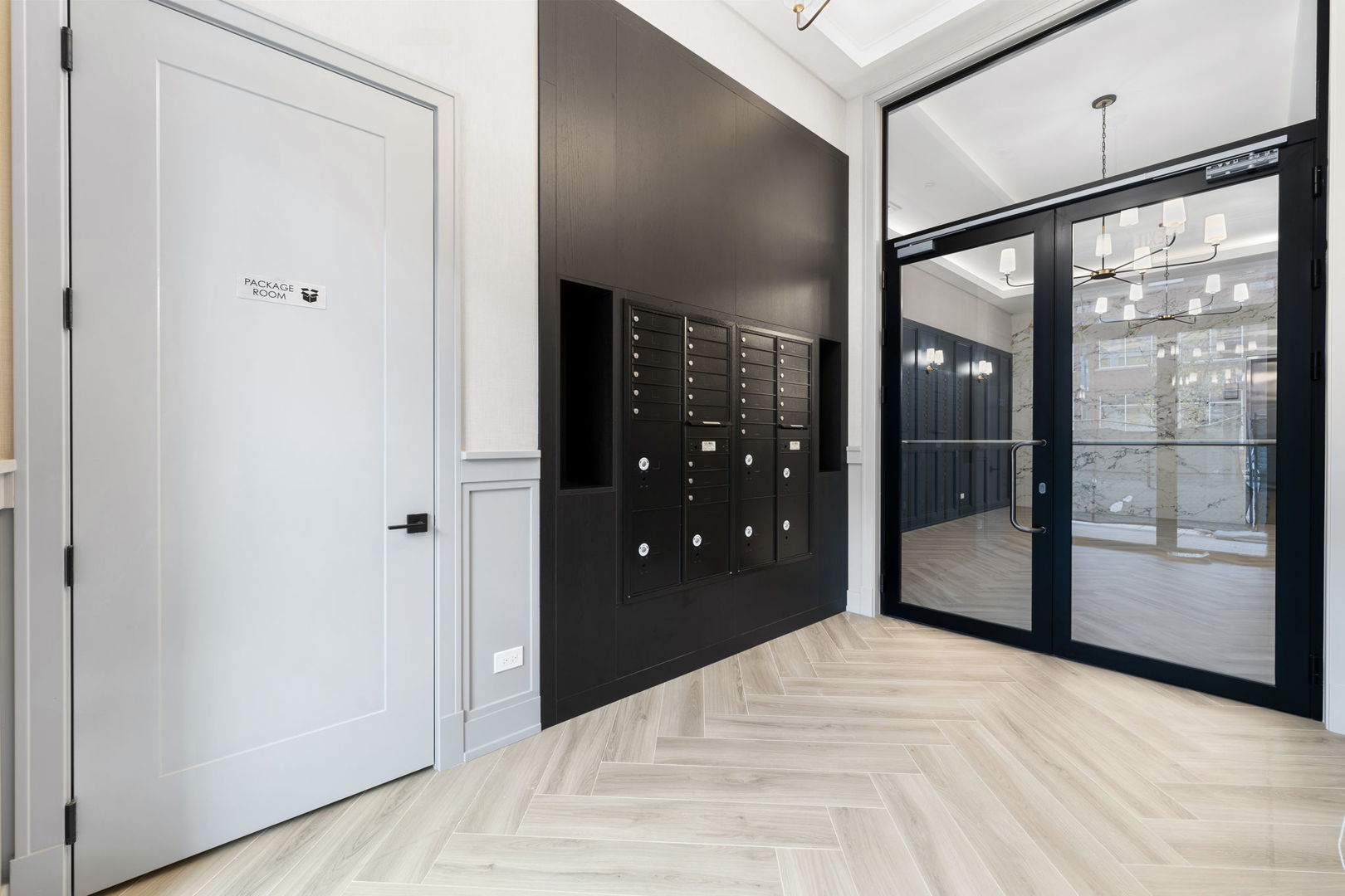 1606 South Ashland Avenue, Unit 401 Chicago, IL 60608 - Photo 23 of 25 a view of a hallway with wooden floor and glass door