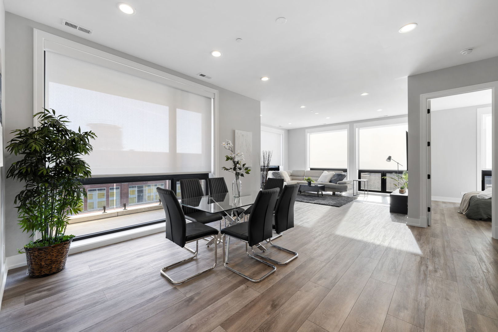 1606 South Ashland Avenue, Unit 401 Chicago, IL 60608 - Photo 5 of 25 a living room with furniture dining room and wooden floor