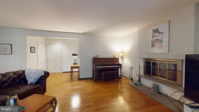 a kitchen with stainless steel appliances a refrigerator and a stove top oven
