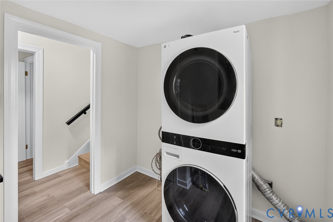 6581 Rural Point Road Mechanicsville, VA 23116 - Photo 39 of 58 Laundry area featuring a stackable washer and drye