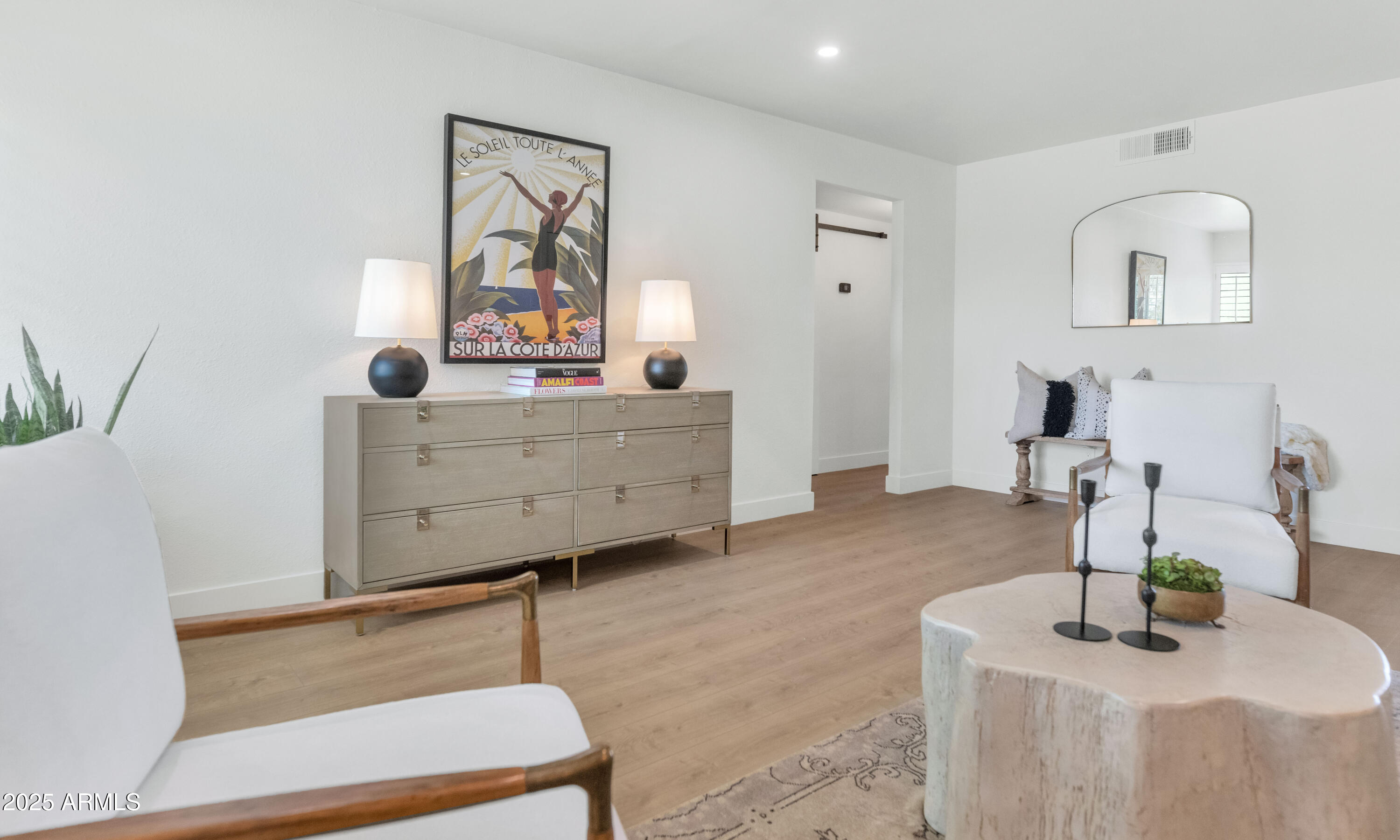 4201 East Camelback Road, Unit 70 Phoenix, AZ 85018 - Photo 14 of 36 a living room with furniture