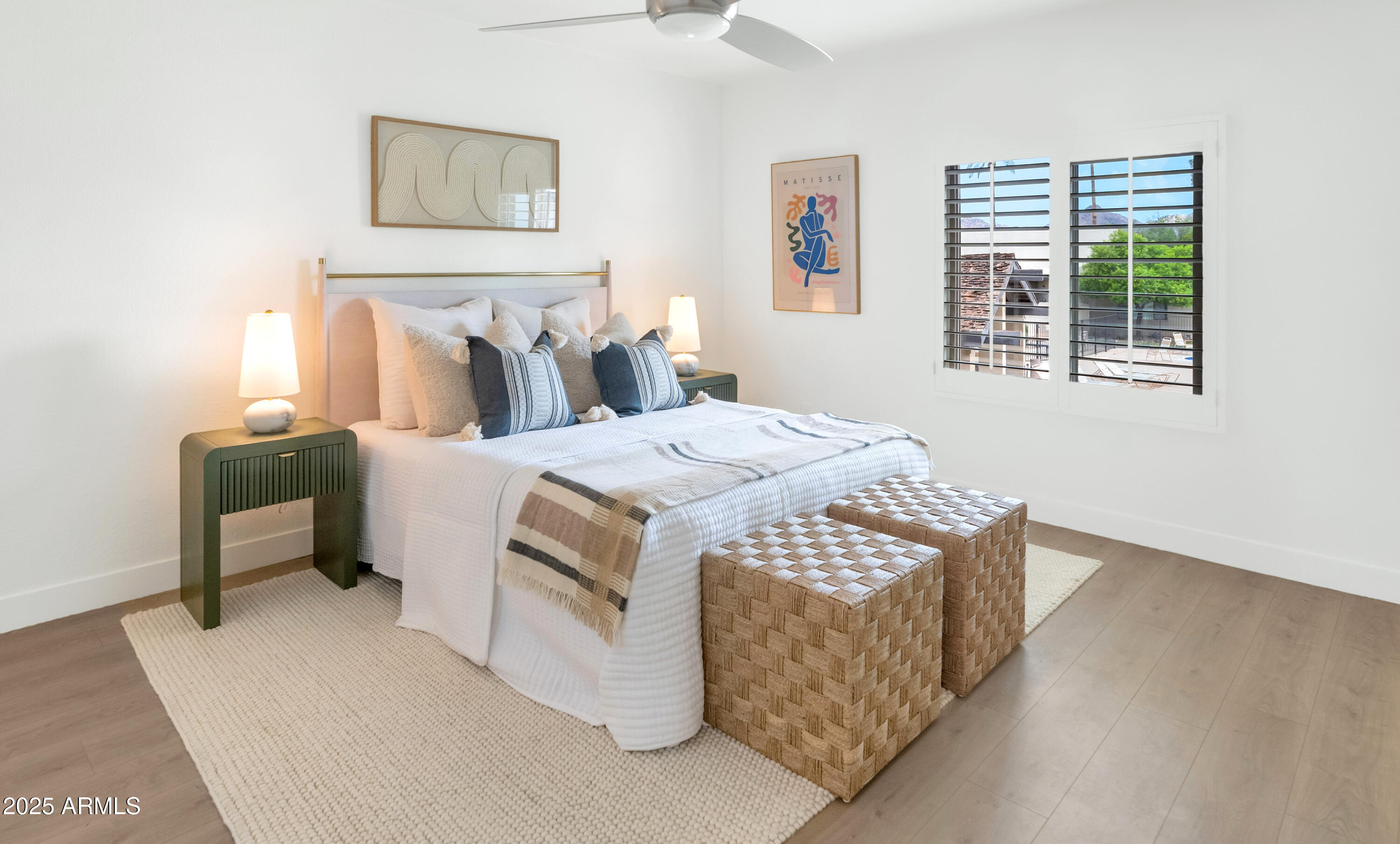 4201 East Camelback Road, Unit 70 Phoenix, AZ 85018 - Photo 18 of 36 a bedroom with a bed and a window