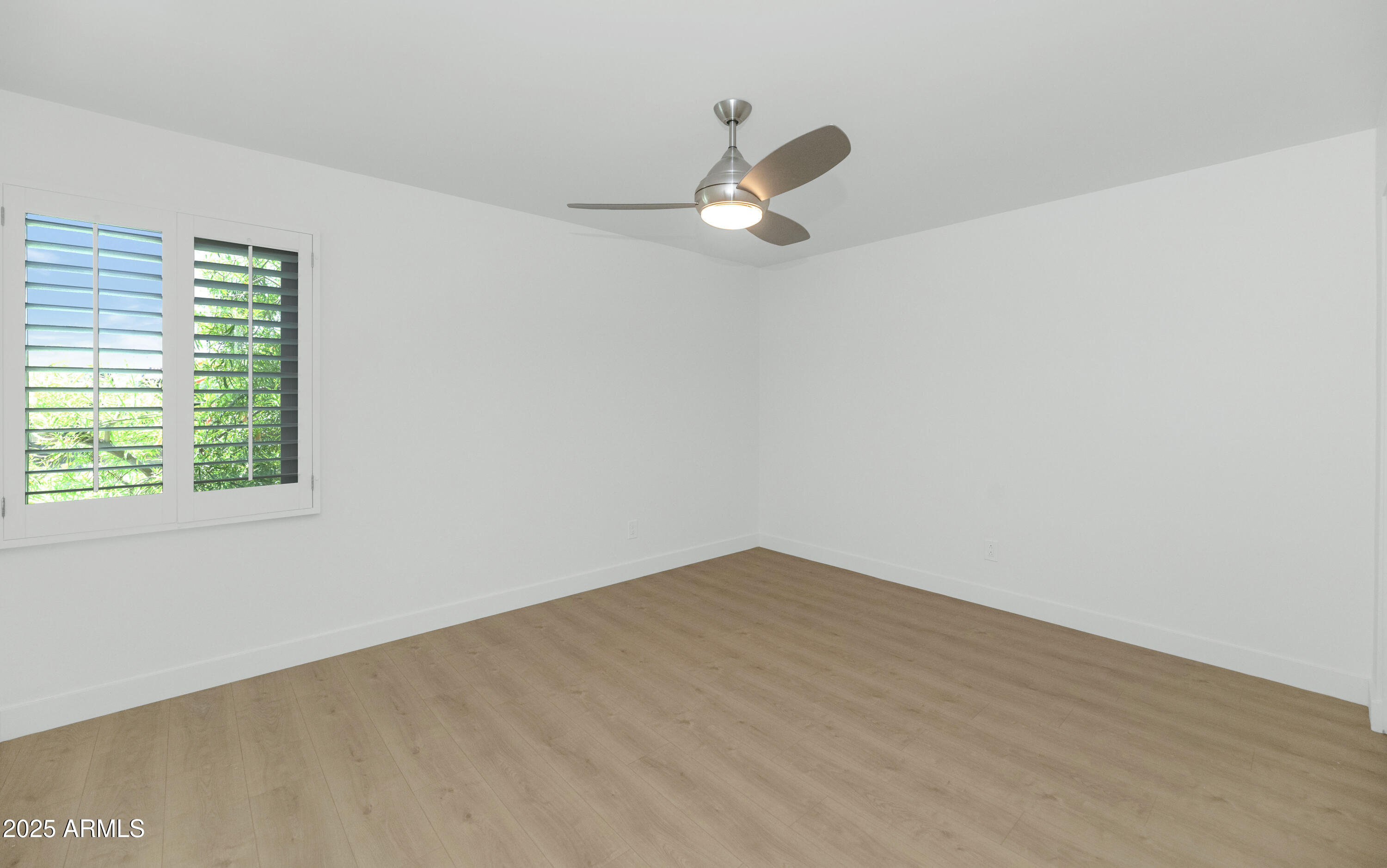4201 East Camelback Road, Unit 70 Phoenix, AZ 85018 - Photo 26 of 36 a view of empty room with window