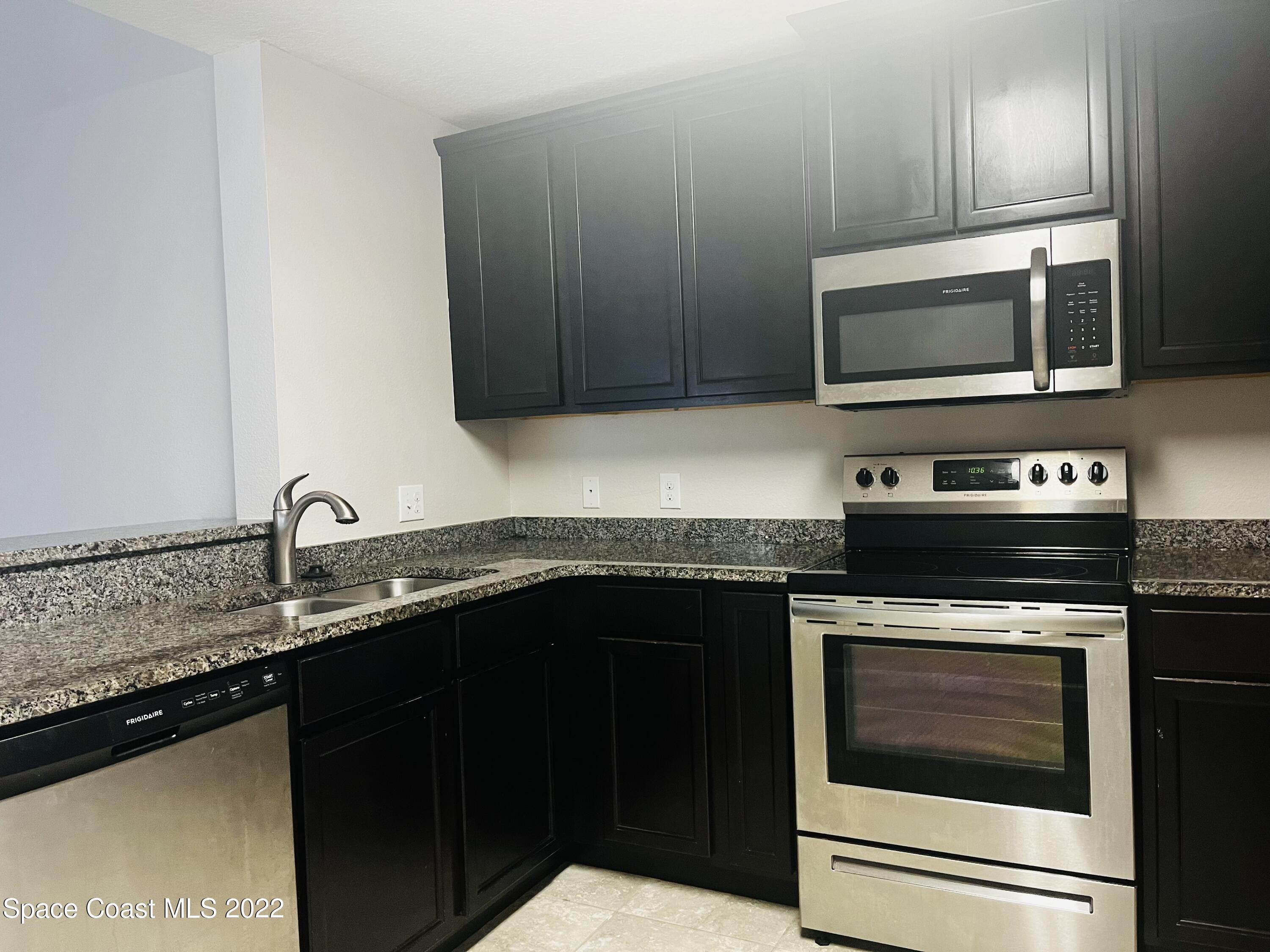 4027 Meander Place, Unit 201 Rockledge, FL 32955 - Photo 4 of 23 IMG_2354