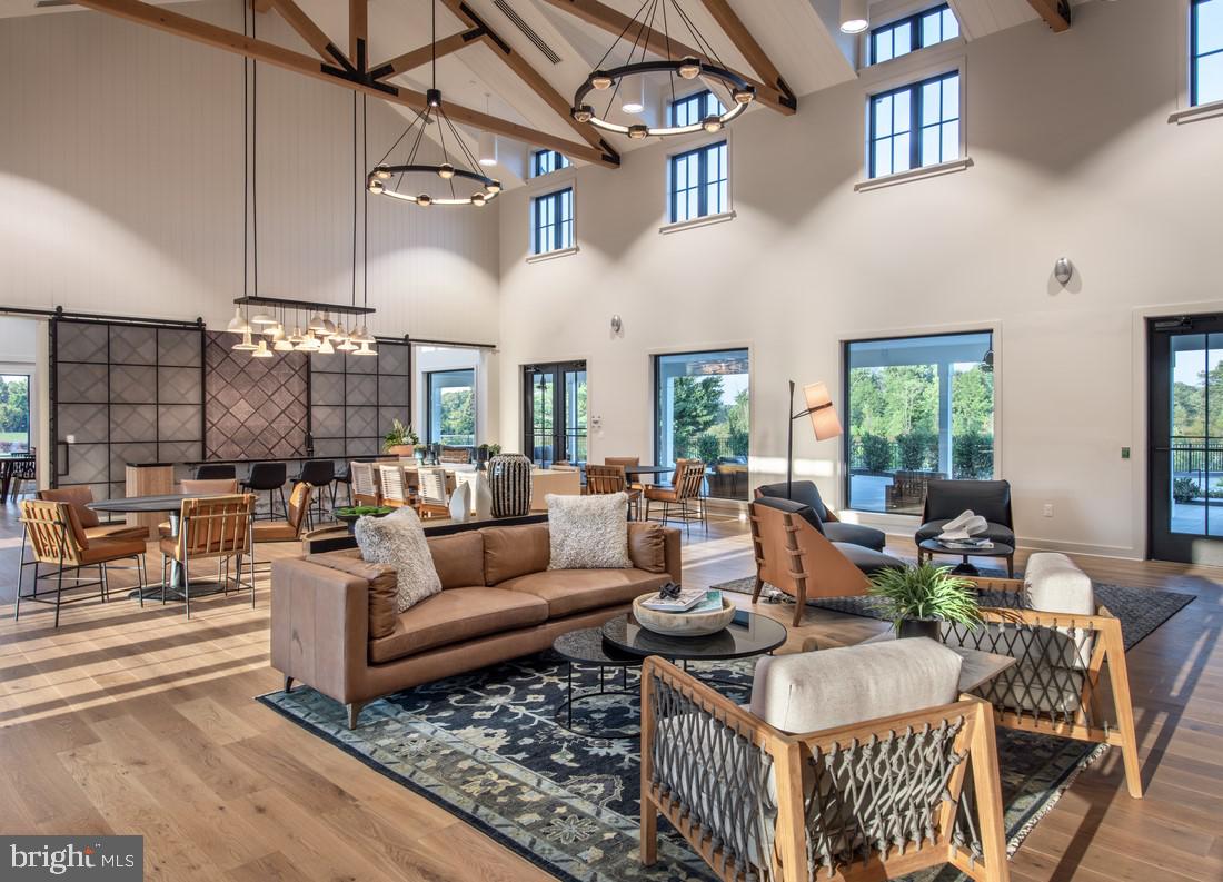 214 Gerry Way, Unit 249 Ambler, PA 19002 - Photo 22 of 38 a living room with furniture and a large window