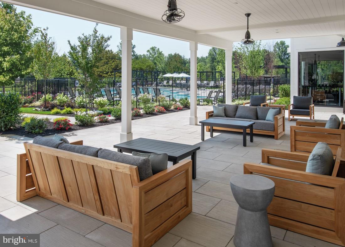 214 Gerry Way, Unit 249 Ambler, PA 19002 - Photo 25 of 38 a outdoor living space with furniture and garden view