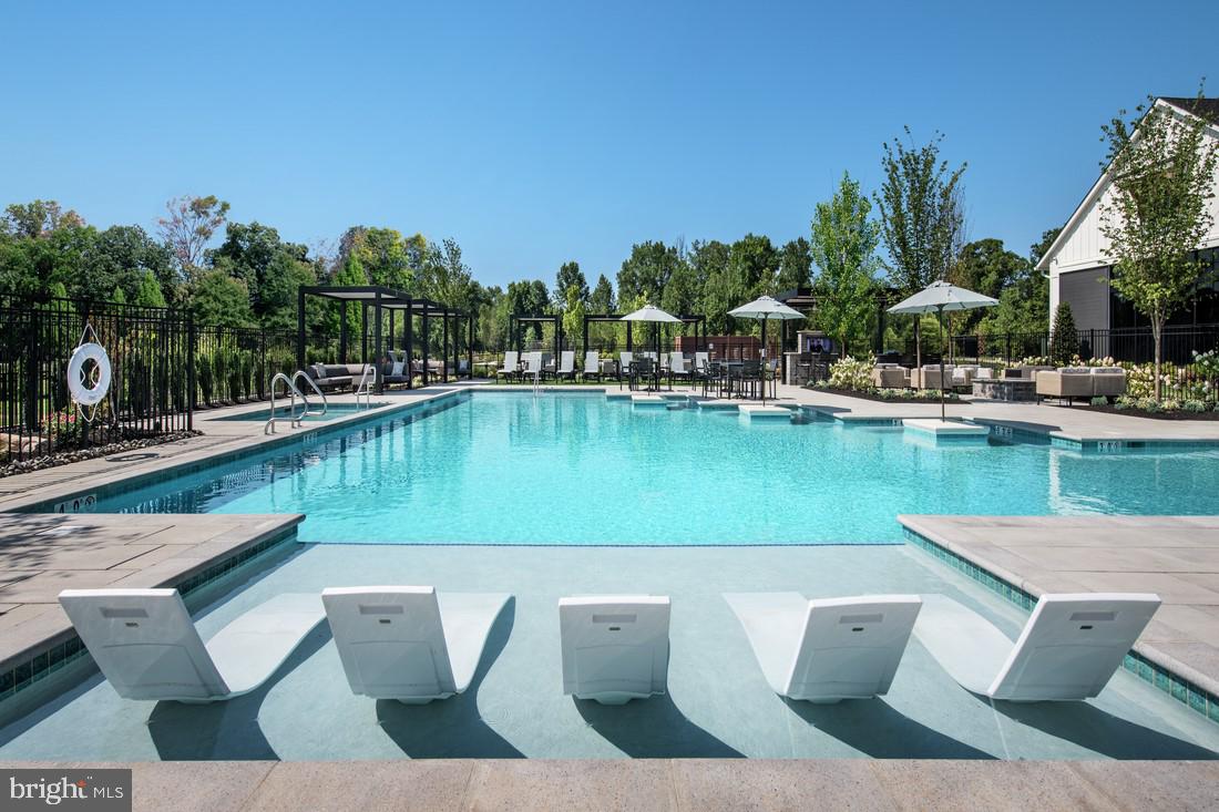 214 Gerry Way, Unit 249 Ambler, PA 19002 - Photo 27 of 38 a view of a swimming pool with a patio