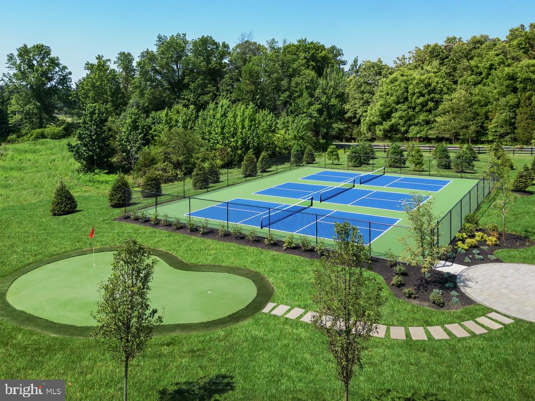214 Gerry Way, Unit 249 Ambler, PA 19002 - Photo 31 of 38 a view of a backyard with swimming pool