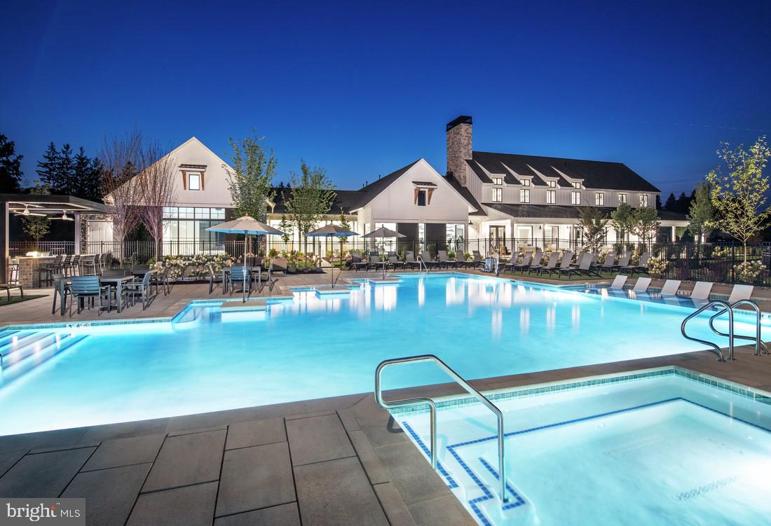 214 Gerry Way, Unit 249 Ambler, PA 19002 - Photo 35 of 38 a view of a swimming pool with outdoor seating