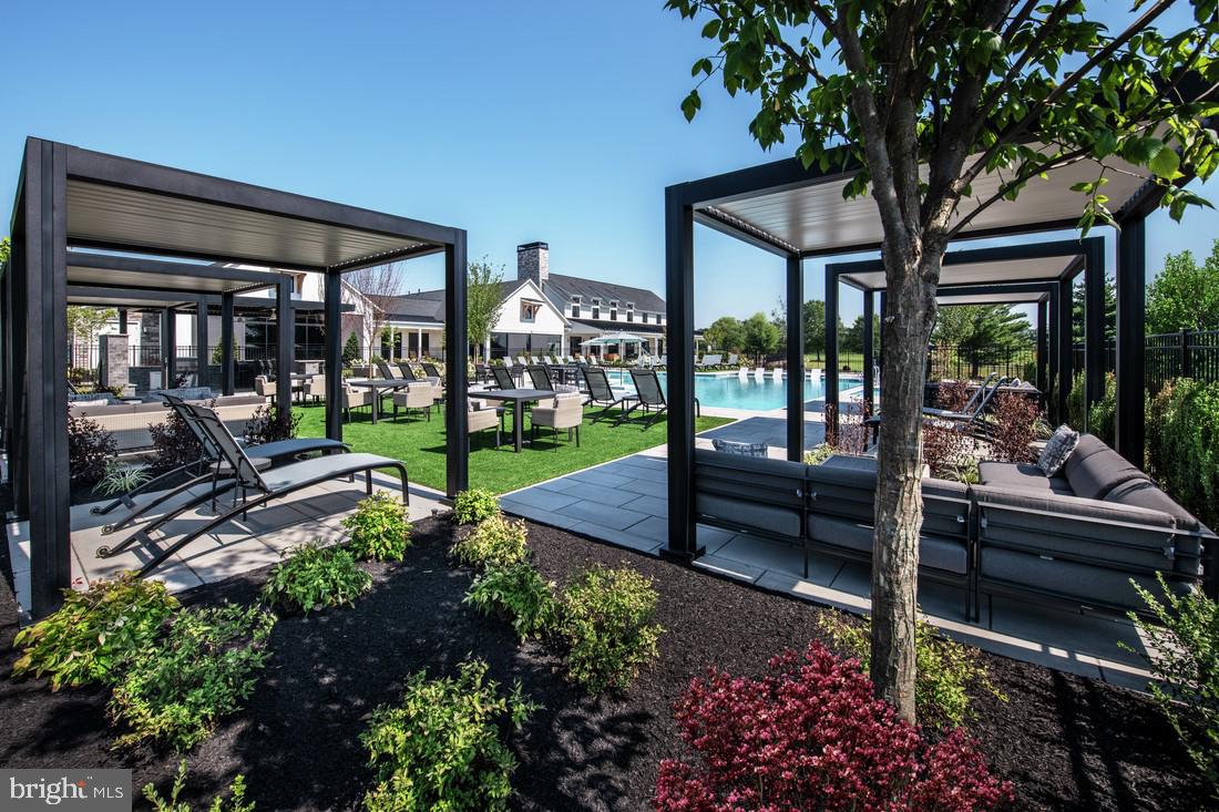 214 Gerry Way, Unit 249 Ambler, PA 19002 - Photo 10 of 38 a view of a garden with patio