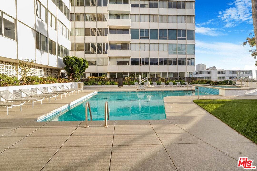 17350 Sunset Boulevard, Unit PH2 Pacific Palisades, CA 90272 - Photo 18 of 36 a view of a swimming pool and a outdoor space