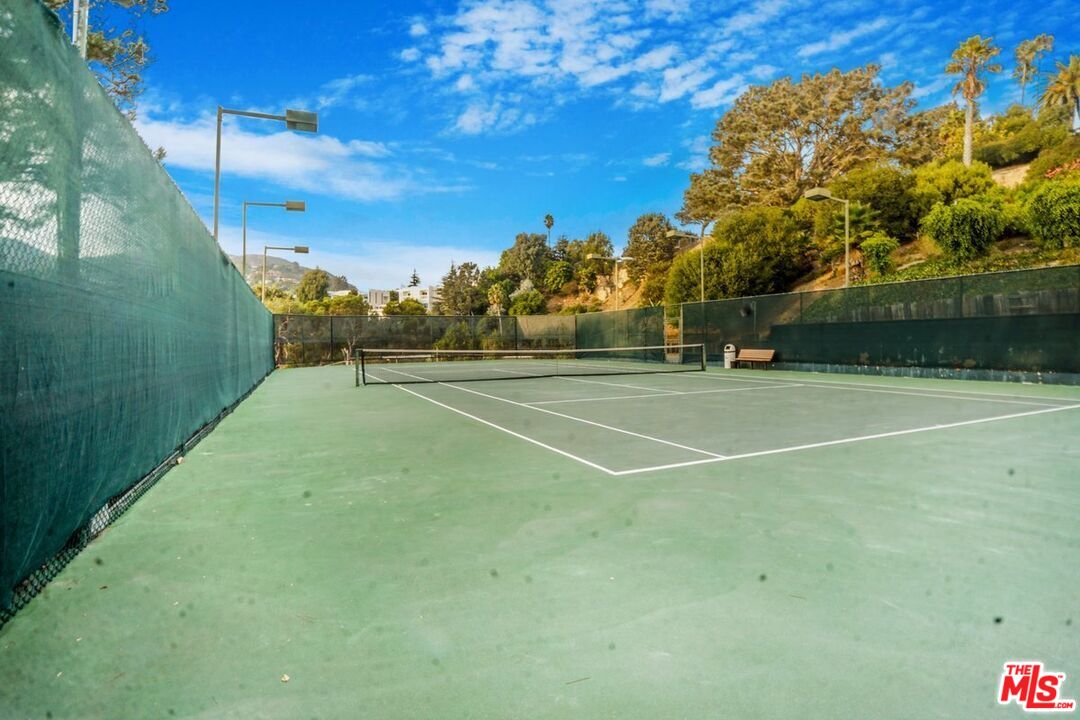 17350 Sunset Boulevard, Unit PH2 Pacific Palisades, CA 90272 - Photo 22 of 36 a view of a tennis court