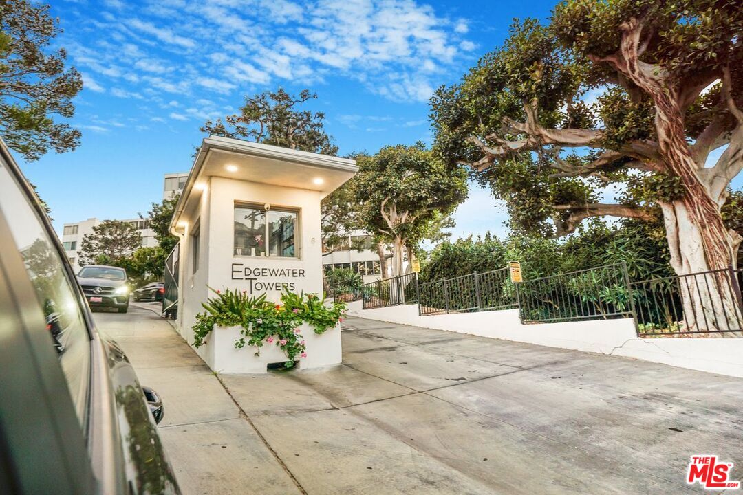 17350 Sunset Boulevard, Unit PH2 Pacific Palisades, CA 90272 - Photo 27 of 36 a view of a house with a tree