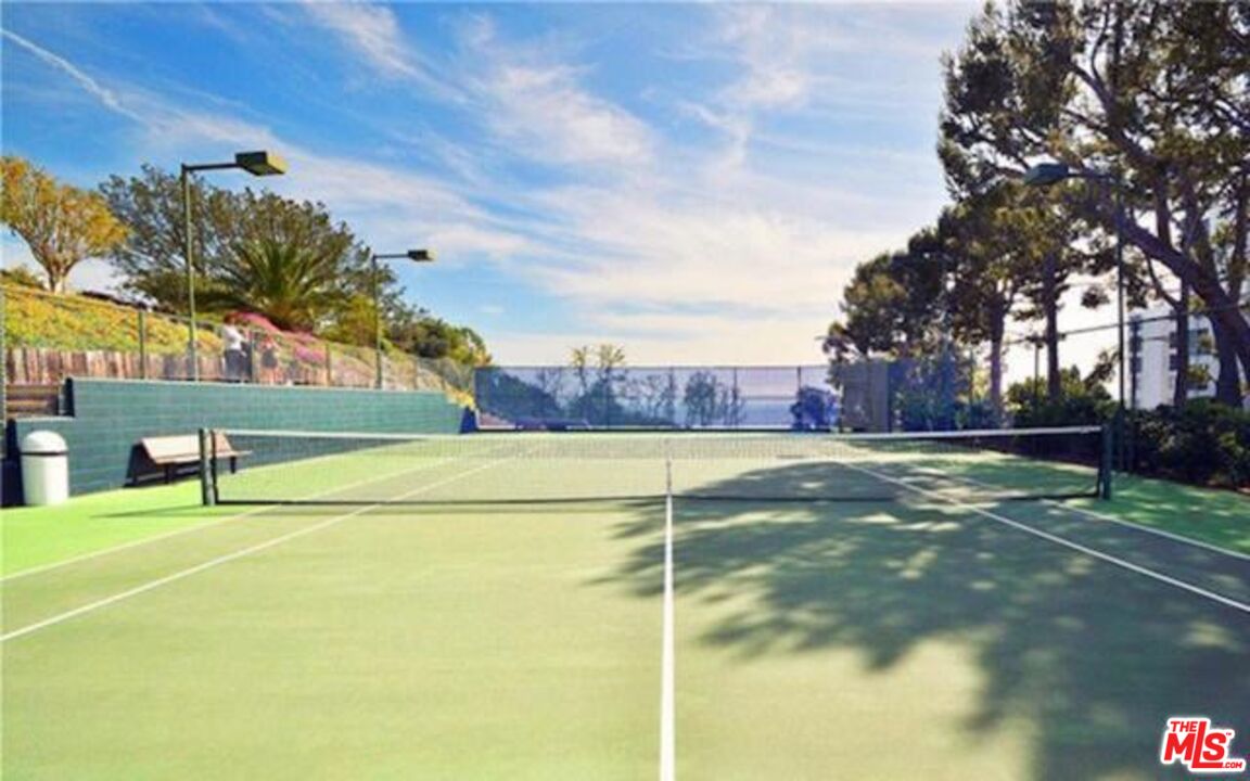 17350 Sunset Boulevard, Unit PH2 Pacific Palisades, CA 90272 - Photo 31 of 36 a view of a tennis court