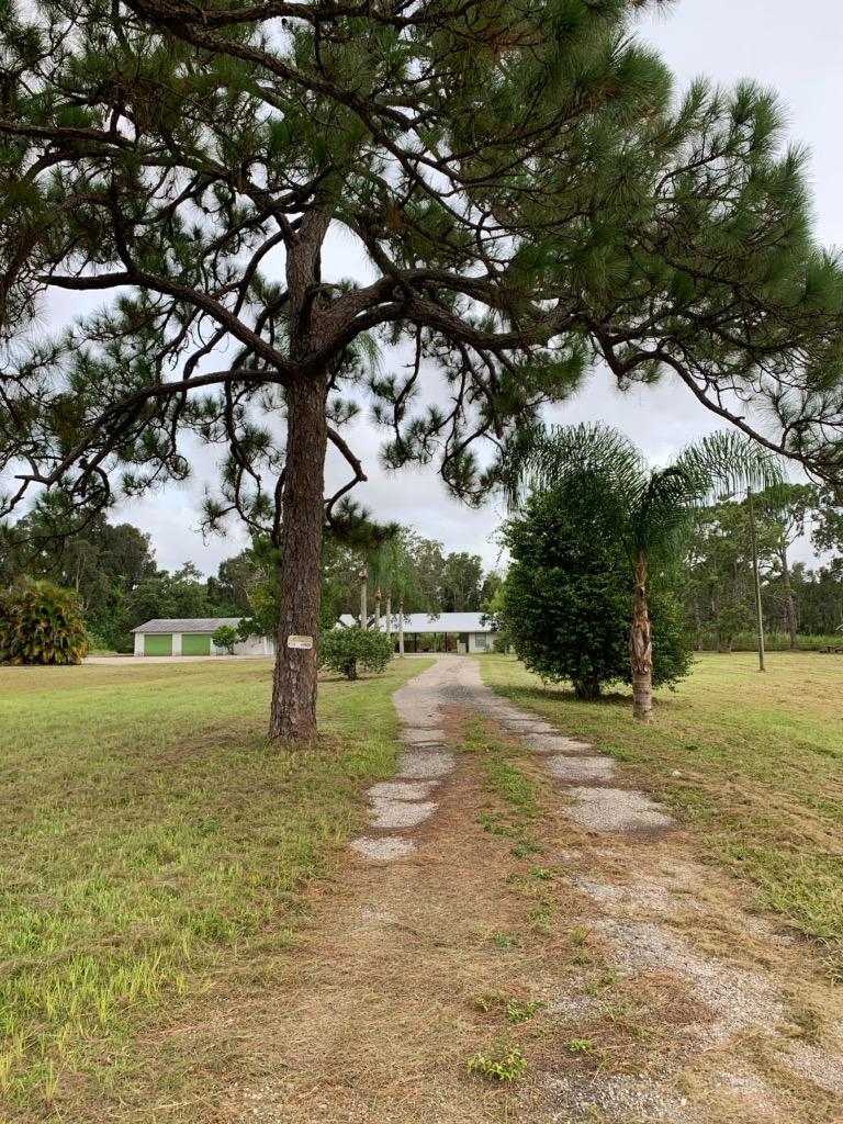 1050 Southeast Salerno Road Stuart, FL 34997 - Photo 1 of 1 Front