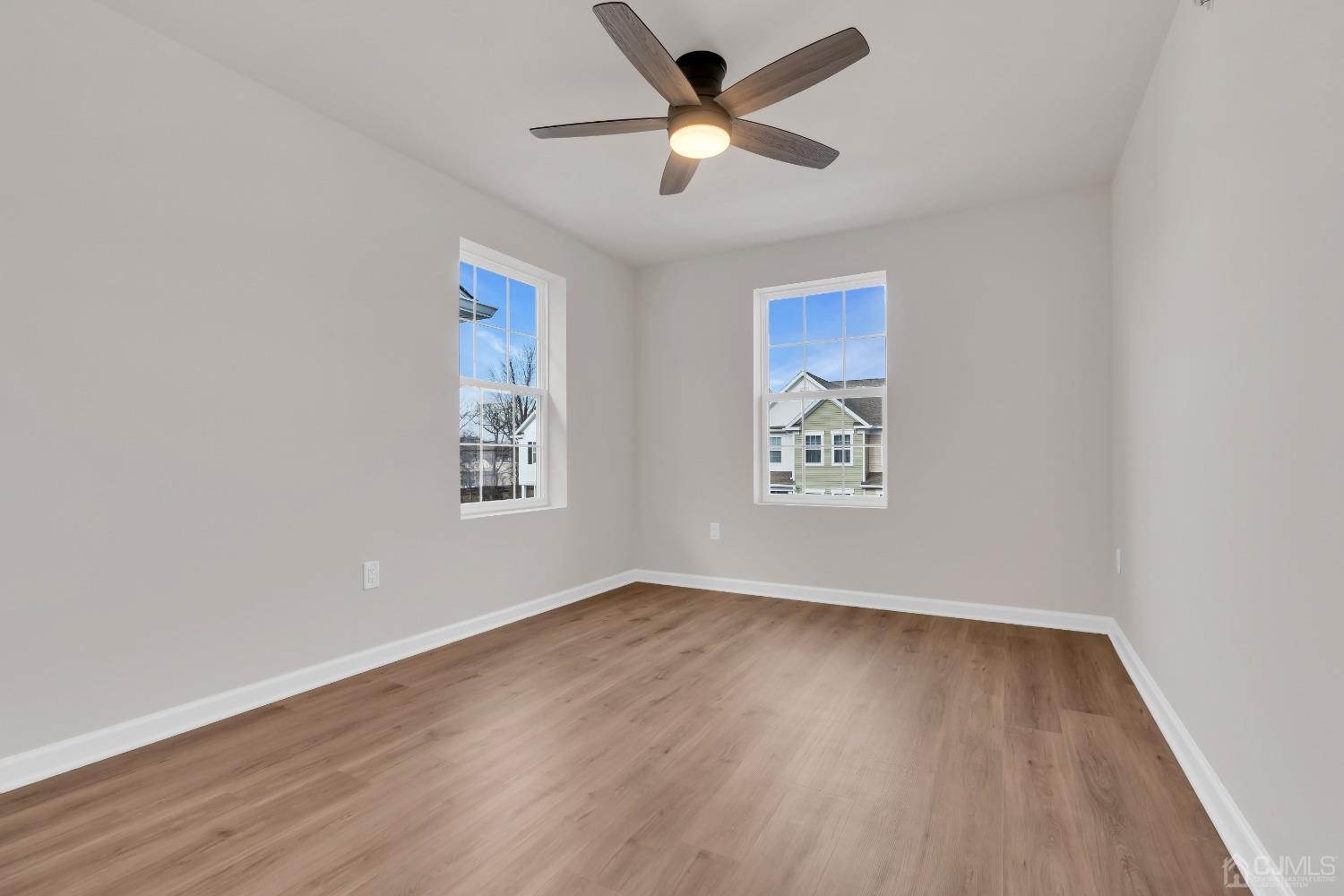 75 Depot Way Dunellen, NJ 08812 - Photo 25 of 28 wooden floor in an empty room with a window