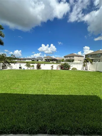 a view of a big room with a big yard