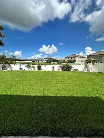 a view of a big room with a big yard