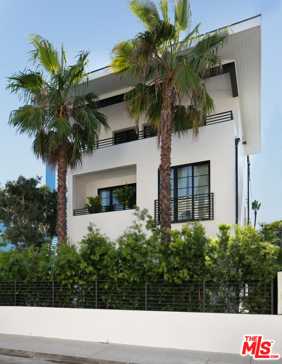 130 Roma Court Marina del Rey, CA 90292 - Photo 1 of 27 a couple of palm trees in front of house