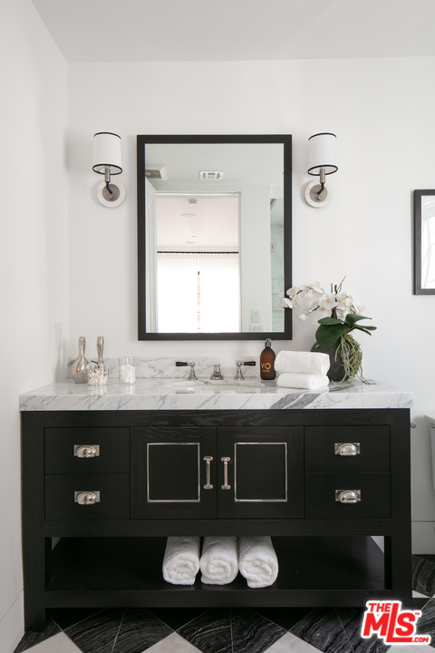 130 Roma Court Marina del Rey, CA 90292 - Photo 15 of 27 a bathroom with a sink and a mirror