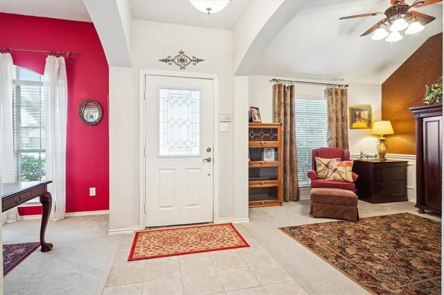 a bedroom with a bed and furniture