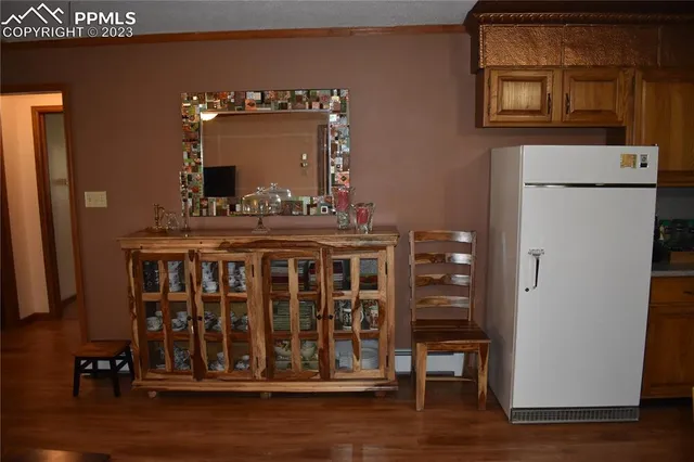 a view of a room that has a bench in it