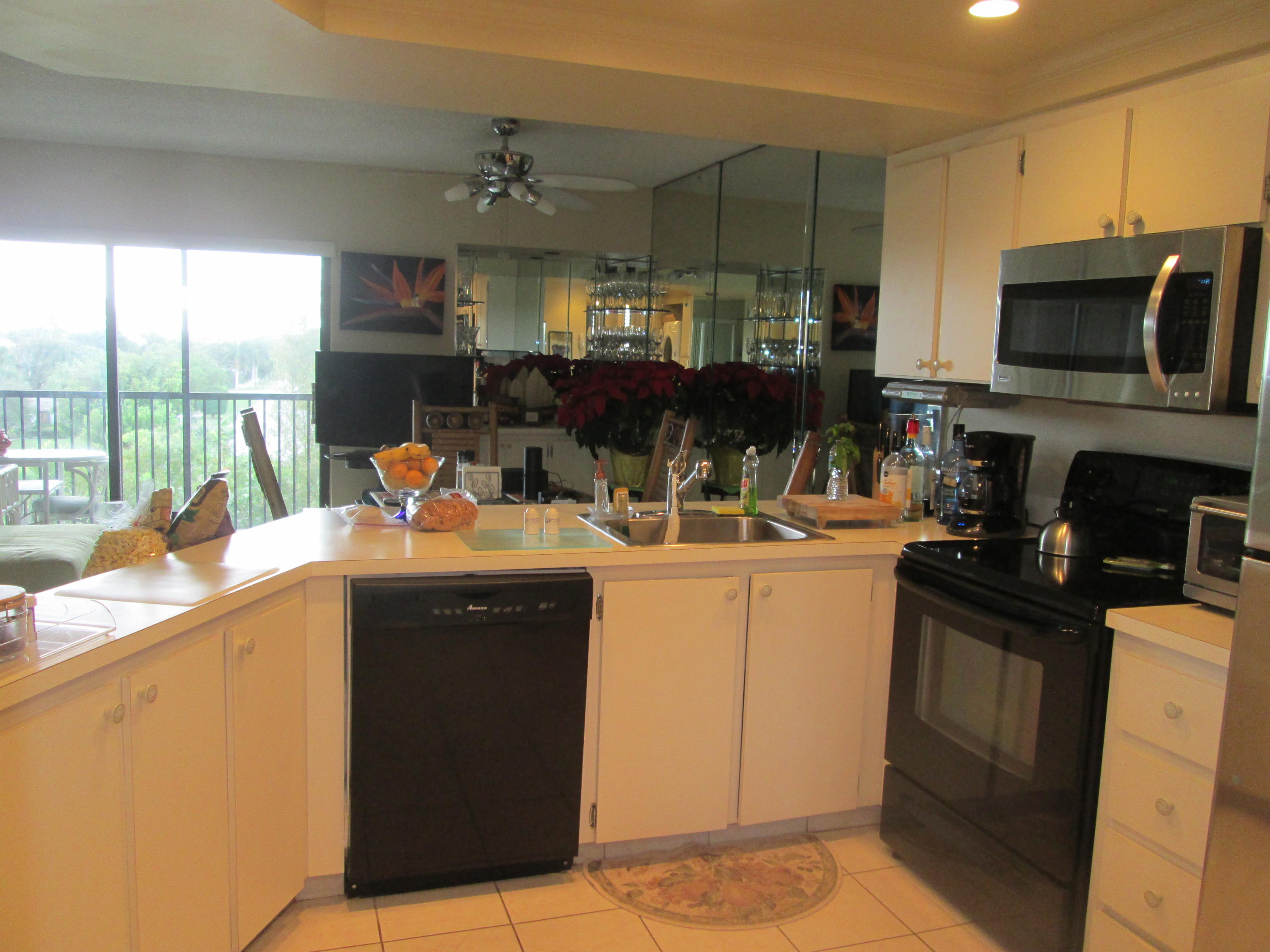 1605 Highway 1, Unit F404 Jupiter, FL 33477 - Photo 3 of 13 IMG_1936